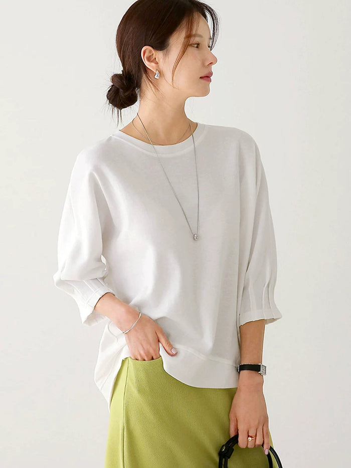 ホワイトのパフスリーブTシャツ 着用 手をポケットに 正面