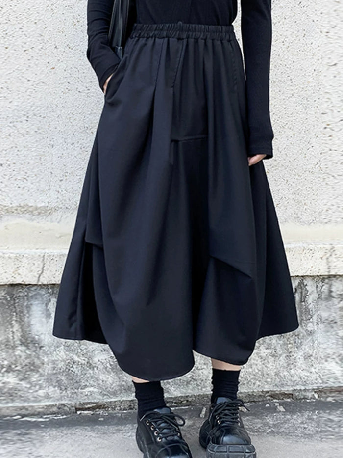 ブラックのアシンメトリー ドレープロングスカート 着用 正面