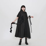 ブラックのシャツワンピース 着用 リボンのディテール