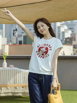 イラストプリントTシャツ 着用 腕を上げて