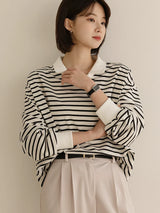 ポロ襟ボーダーTシャツ 着用 腕時計を見て