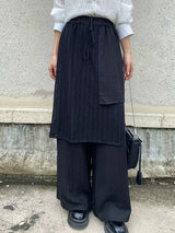 ブラックのメッシュ切り替えワイドパンツ 着用 パネルとポケット