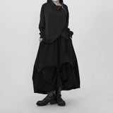 ブラックのアシンメトリースカート 着用 全身 ジャケット合わせ