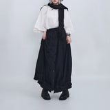 ブラックの大判ストール 白トップスに合わせた着こなし