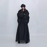 ブラックのボアカラー中綿コート 着用 横