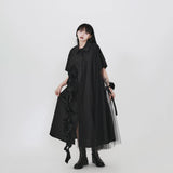 ブラックのシャツワンピース 着用 全身 斜め