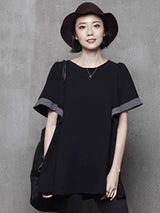 ブラックのフリル袖シフォントップス 着用 正面