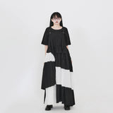 白黒のロングジャンパースカート 着用 斜め 全身