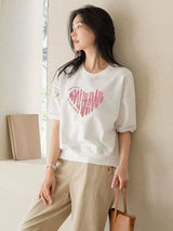 ドロップショルダーTシャツ ホワイト ハート柄 着用 横向き